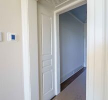 Custom raised panel wainscoting installation