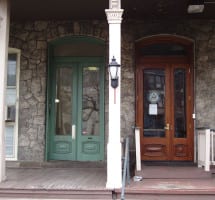 Custom entry door on commercial building in Historic district of Philadelphia. Door were made to match adjacent door, but modified to comply with ADA standards.