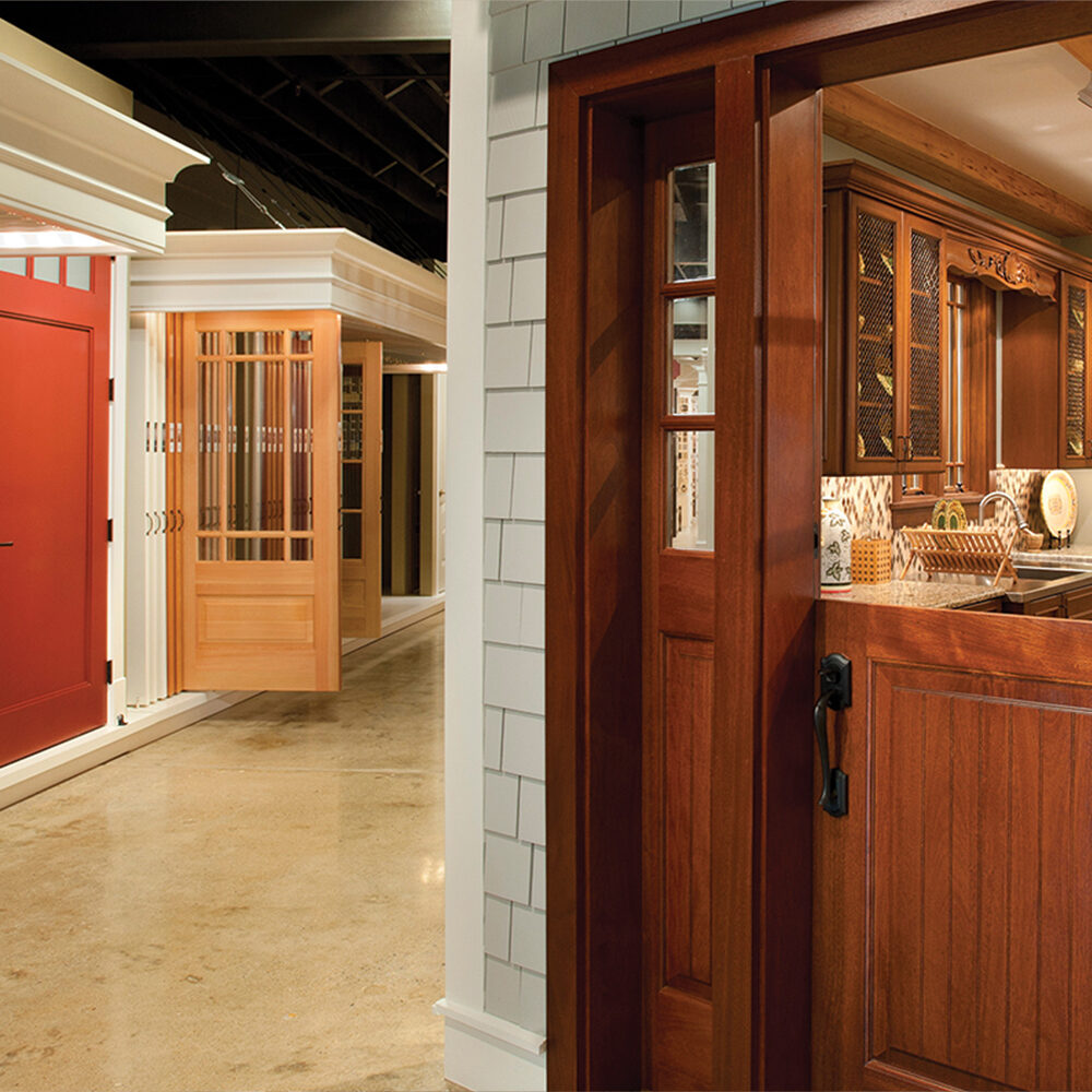 Displays of wood dutch door and other door styles available from Tague Lumber